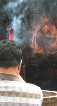 Praying in Tianjin, China Praying in Tianjin, China