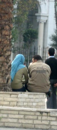 Young Egyptian couple chatting in a Cairo park, 2007