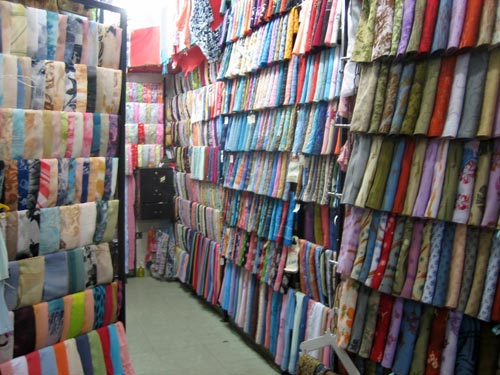 Stalls of women's headscarves for sale in the Roxy/Heliopolis markets of Cairo, 2007