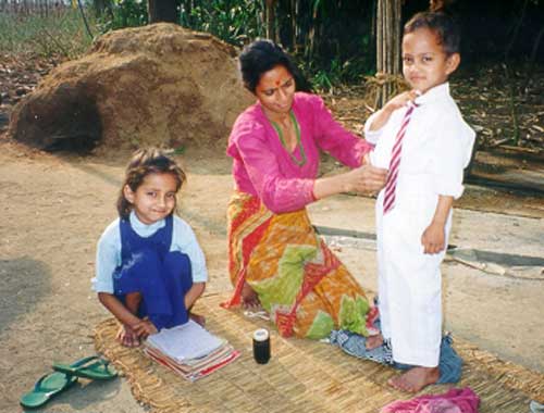 Mother Preparing Child for School, Nepal, Around 2000