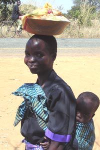 African Woman with child and basket