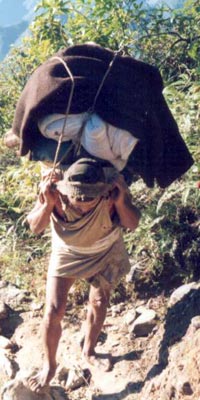 Porter Carrying Load in Himalaya Mountains, Nepal, 1980s